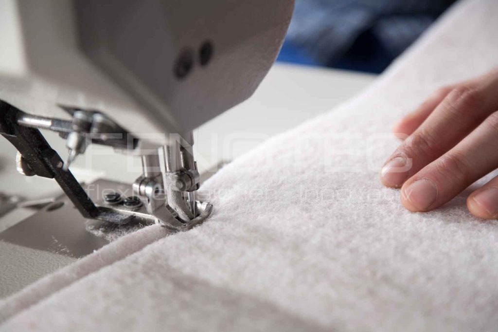 Vlies wird mit Nähmaschine vernäht